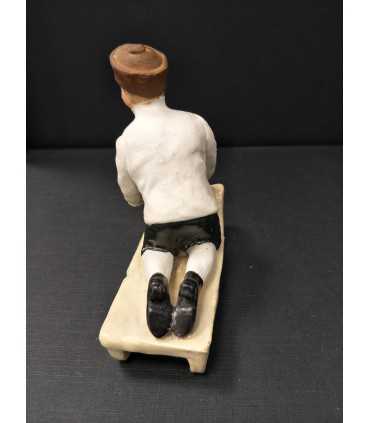 Статуэтка "Парень на санях"