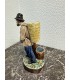 Статуэтка "Мужик с корзинкой"