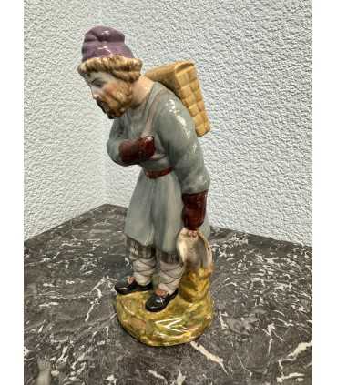 Статуэтка "Мужик с добычей"